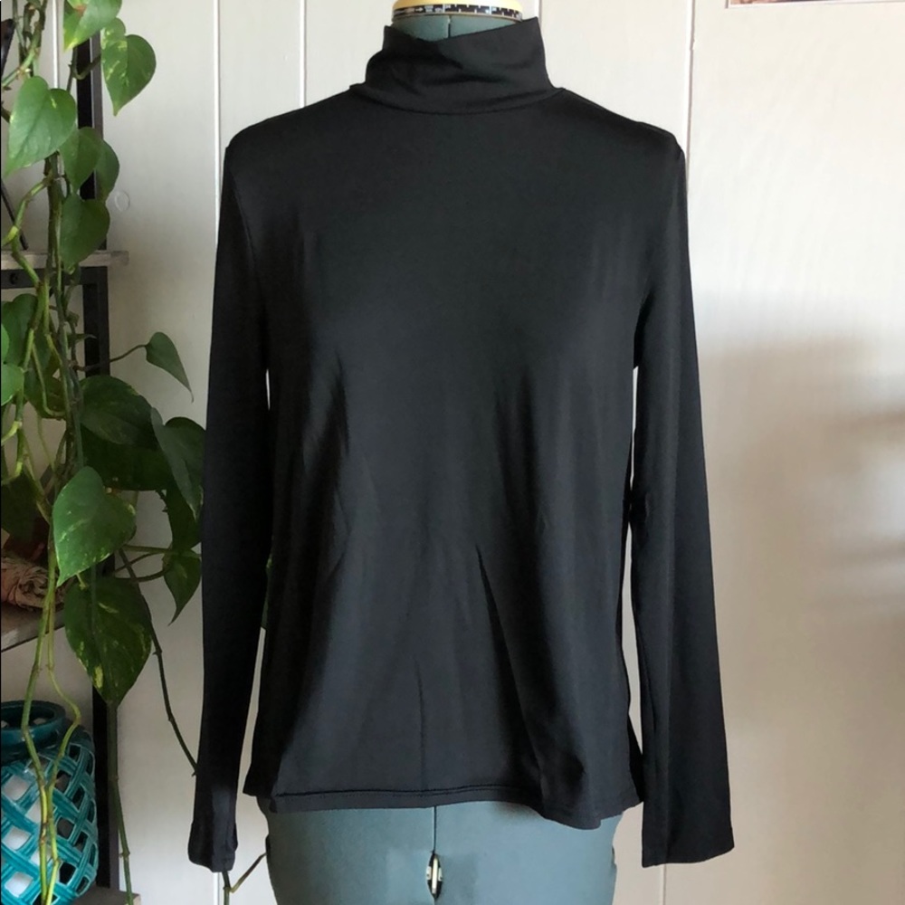 Black, open back, long sleeved top